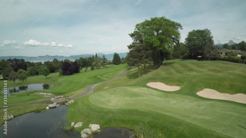 Golf Course Aerial with players on the course Golf Course Aerial with players on the course