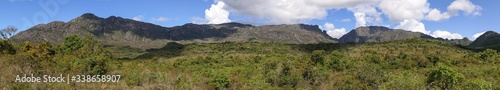 Panorama of beautiful green mountain scenery with blue sky and clouds of Caraca natural park  Minas Gerais  Brazil 