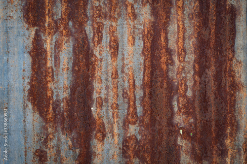 old rusty galvanized, corrugated iron siding vintage texture background