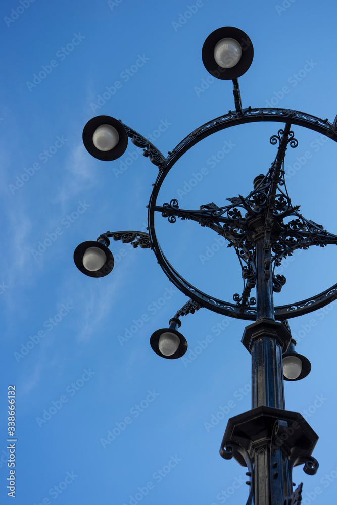 street lamp on blue sky