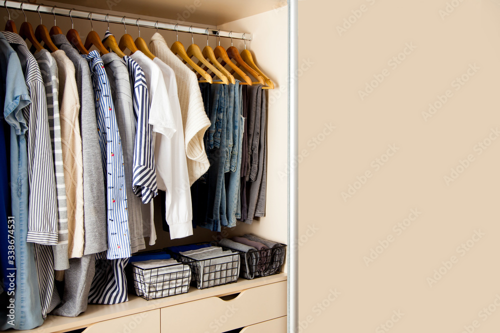 Wardrobe with perfect order clothes shades. Copy space. Wardrobe with perfect order clothes shades. Copy space.