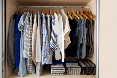 Wardrobe with perfect order clothes shades © kostikovanata