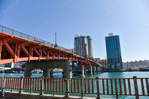 Busan city, South Korea - OCT 31, 2019: Tourists near drawbridge- Yeongdodaegyo Bridge in Jung-gu, Busan