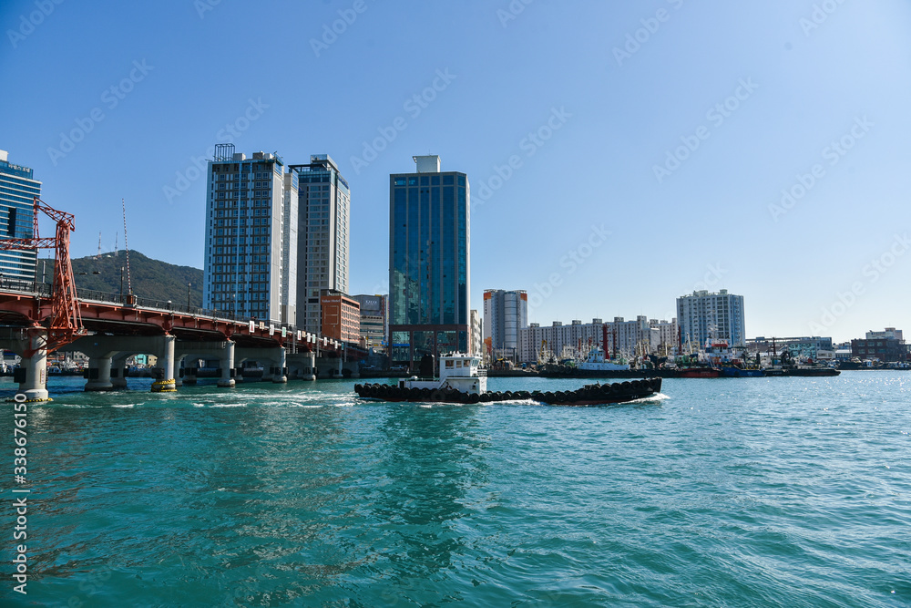 Busan city, South Korea - OCT 31, 2019: Tourists near drawbridge- Yeongdodaegyo Bridge in Jung-gu, Busan