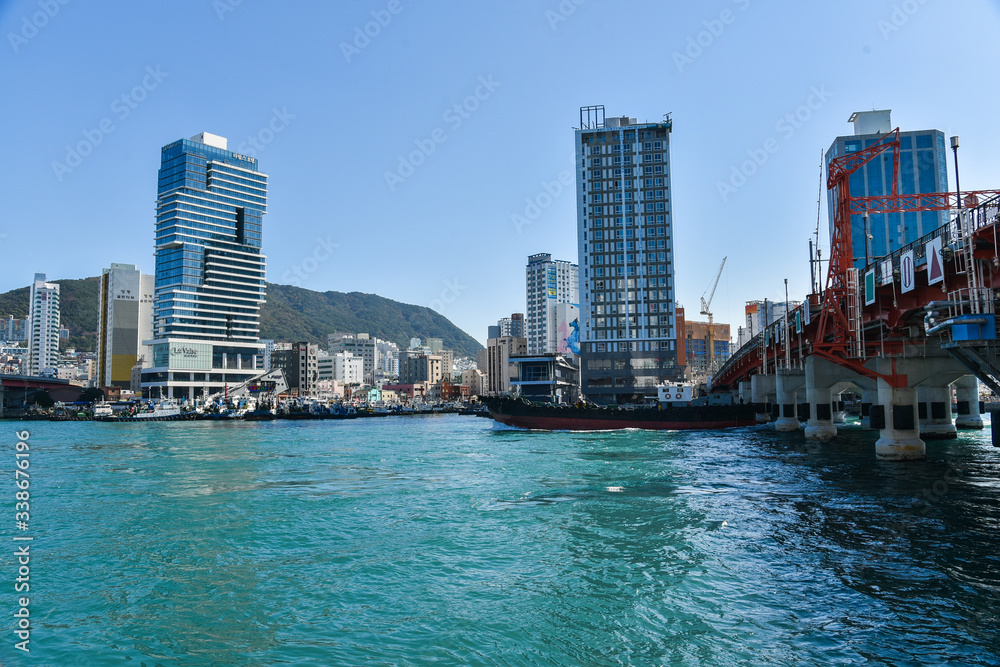 Busan city, South Korea - OCT 31, 2019: Tourists near drawbridge- Yeongdodaegyo Bridge in Jung-gu, Busan Busan city, South Korea - OCT 31, 2019: Tourists near drawbridge- Yeongdodaegyo Bridge in Jung-gu, Busan