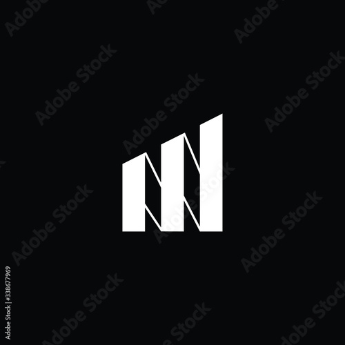 Minimal elegant monogram art logo. Outstanding professional trendy awesome artistic MN NM WN NW initial based Alphabet icon logo. Premium Business logo White color on black background