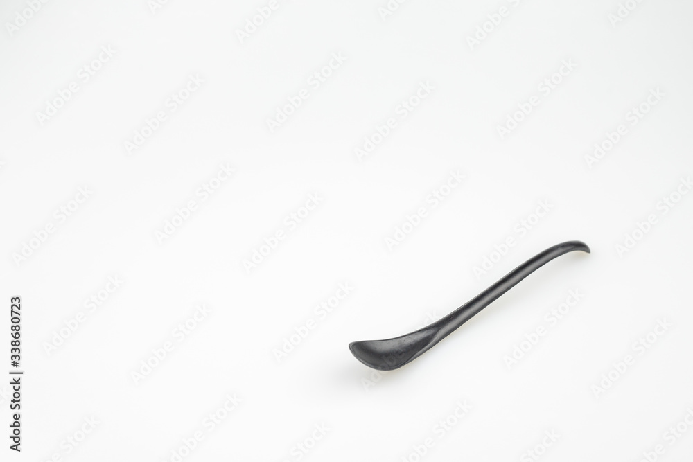 a spoon for scooping chemicals used in a lab. a spoon for scooping chemicals used in a lab.