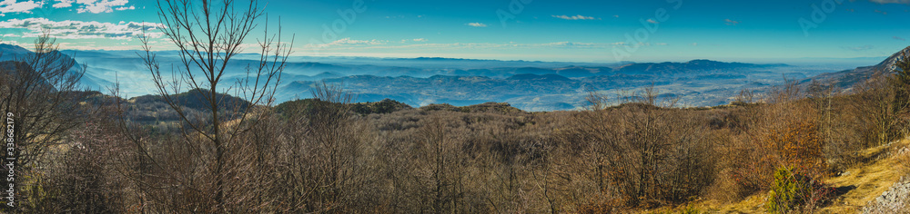 Beautiful panorama in january sun above the Vipava valley in Slovenia, looking from the top of Kovk mountain.