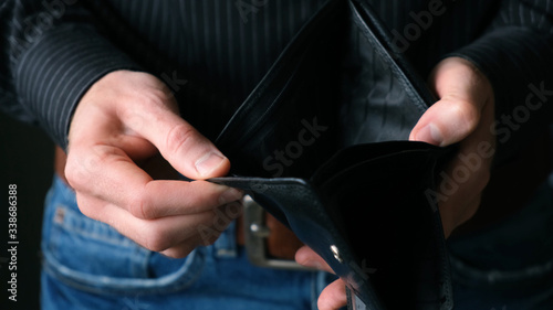 Empty Wallet In Male Businessman Hands. Bankruptcy Concept  Financial Crisis  No Money