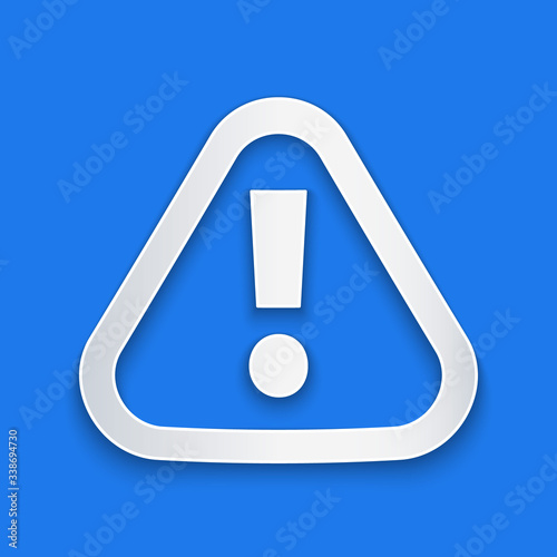 Paper cut Exclamation mark in triangle icon isolated on blue background. Hazard warning sign, careful, attention, danger warning important. Paper art style. Vector Illustration