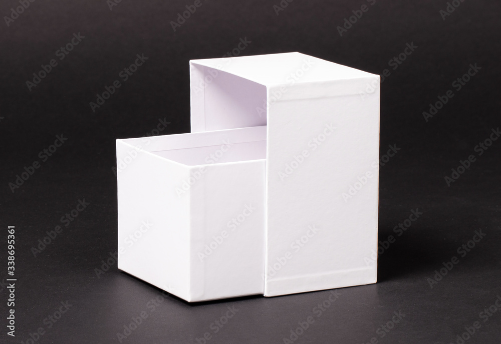 Opened blank White box on black background Opened blank White box on black background