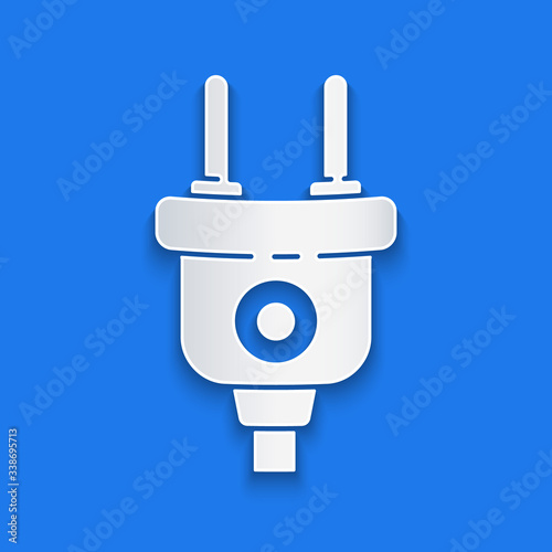 Paper cut Electric plug icon isolated on blue background. Concept of connection and disconnection of the electricity. Paper art style. Vector Illustration