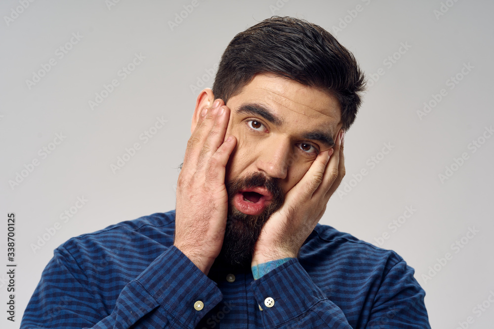 portrait of a man with a headache