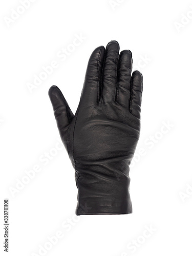 Isolated woman's hand wearing a black leather glove palm down, fingers together, thumb turned out