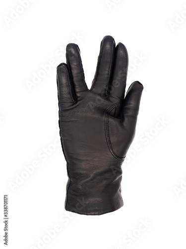 Isolated woman's hand wearing a black leather glove palm up in the posture of the Vulcan salute with the thumb tucked in