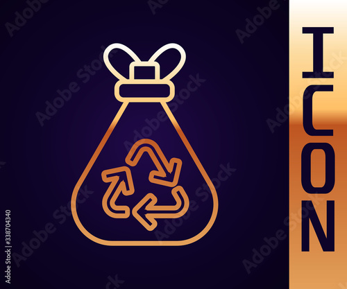 Gold line Garbage bag with recycle symbol icon isolated on black background. Trash can icon. Recycle basket sign.  Vector Illustration