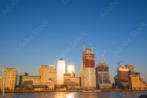 Canary Wharf cityscape in London with cloudless sky photo