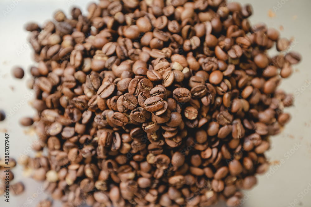 Roasted coffee beans pile. From top view Roasted coffee beans pile. From top view