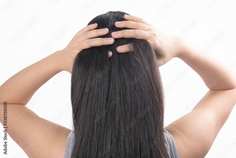 Beautiful young woman after procedure of hair extension in professional salon on white background.hair loss problem and Hair treatment concept Beautiful young woman after procedure of hair extension in professional salon on white background.hair loss problem and Hair treatment concept