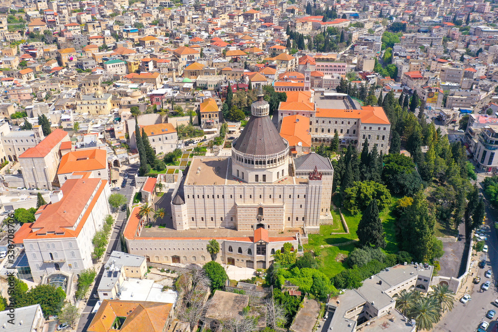 Aerial image of the Basilica of the Annunciation over the old city houses of Nazareth