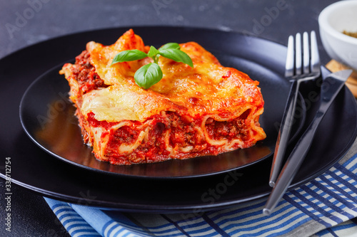 Stuffed pasta manicotti with bolognese on a plate