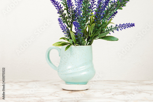 Wallpaper Mural Lavender flowers in a mug on a marble table Torontodigital.ca