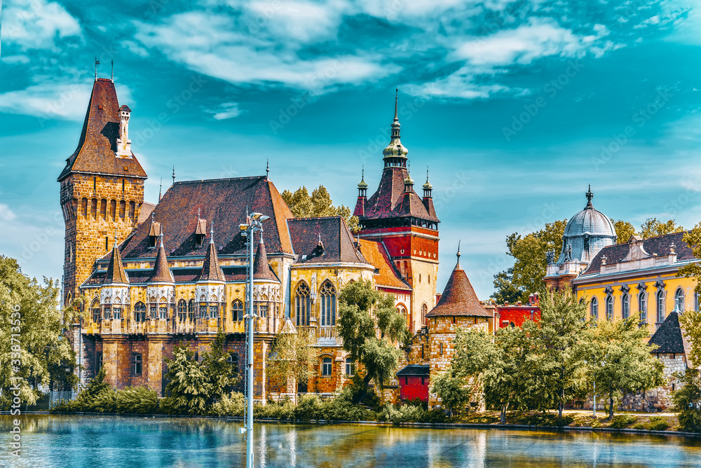Naklejka premium Vajdahunyad Castle (Hungarian-Vajdahunyad vara) with lake reflection. Budapest, Hungary.