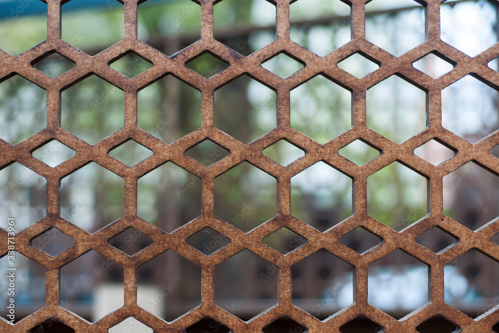 Fototapeta premium The texture of a modern wall with multi-faceted holes