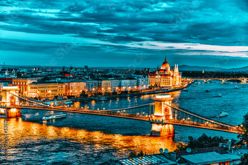 Szechenyi Chain Bridge and Parliament at dusk. Budapest, Hungary. photo