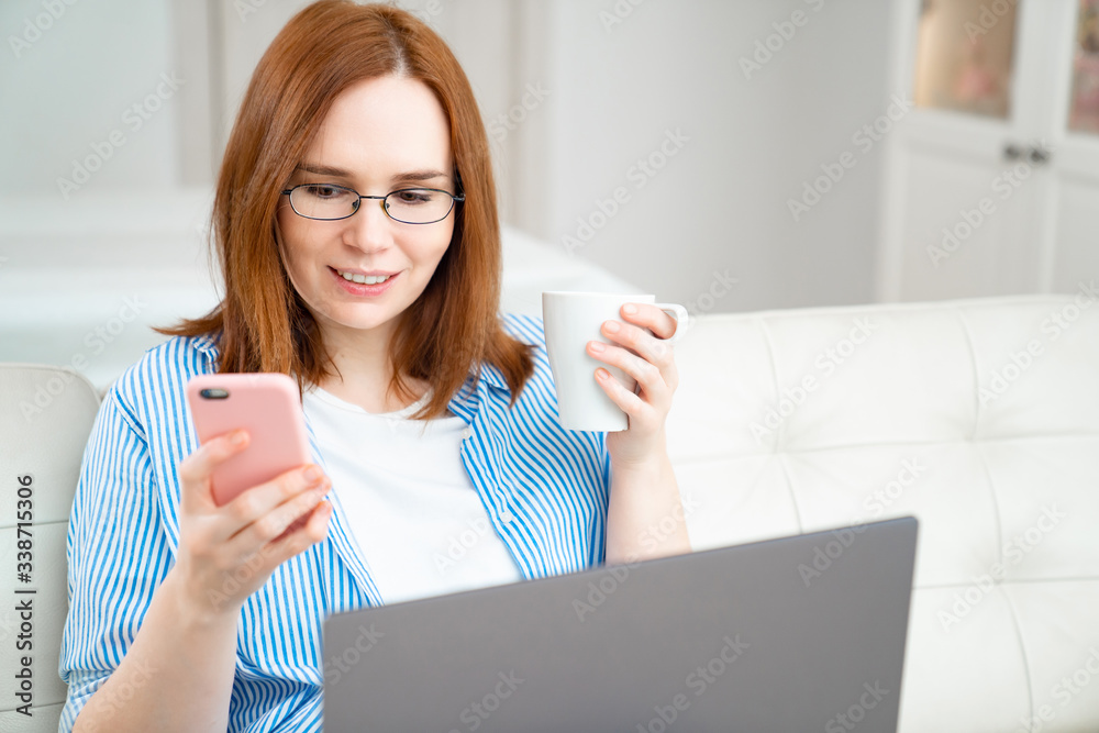 freelancer female drink tea and read messages. freelancer female drink tea and read messages.