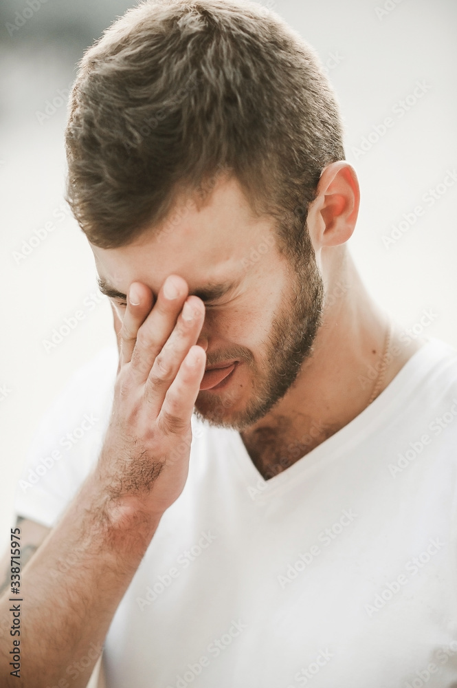 smiling friendly guy with a variety of emotions; a man in a white T-shirt and jeans with a clock on his hand; smiling friendly guy with a variety of emotions; a man in a white T-shirt and jeans with a clock on his hand;