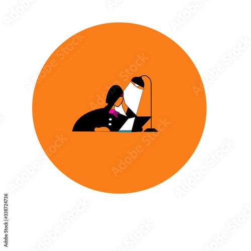 A woman working until night at her desk at home