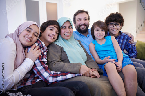 muslim family portrait at home