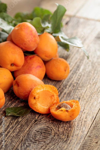 Fresh apricots on a old wooden table.