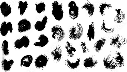 Interesting collection.Grunge spots hand drawn. Black textured smears set isolated on imitation transparent background.Vector grunge texture scribbles, abstract dash lines or brushstrokes, ink smudges