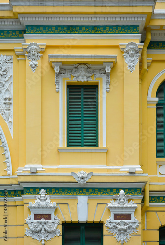 Saigon Central Post Office. Detail of the facade with the names of French scientists Chappe and Ampere on it
