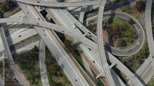 AERIAL: Judge Pregerson Huge Highway Connection showing multiple Roads, Bridges, Viaducts with little car traffic in Los Angeles, California on Beautiful Sunny Day  photo