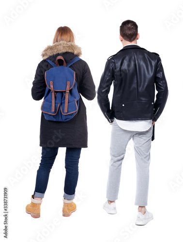 Back view of couple in winter jacket.