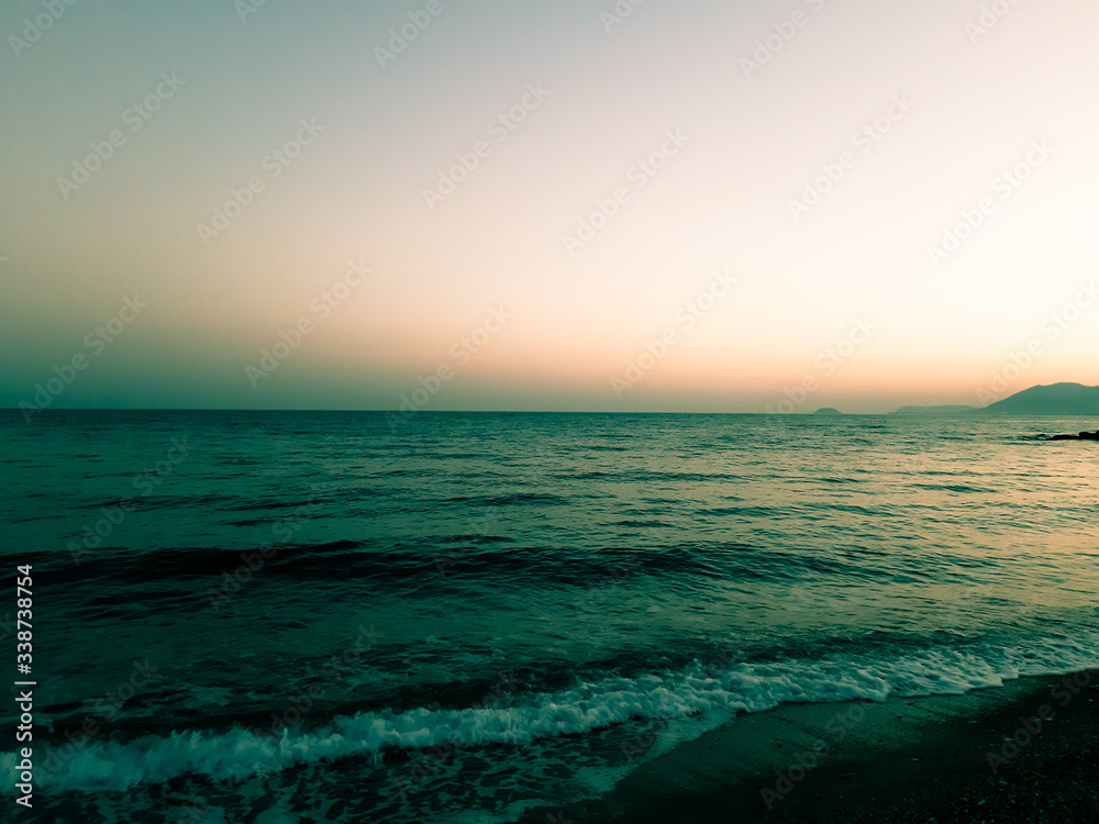 Fototapeta premium Genova, Italy - 04/14/2020: Old photography of the Ligurian seaside edited with basic programs from home during the COVID-19 outbreak.