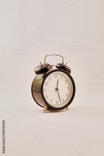 retro alarm clock on a white background