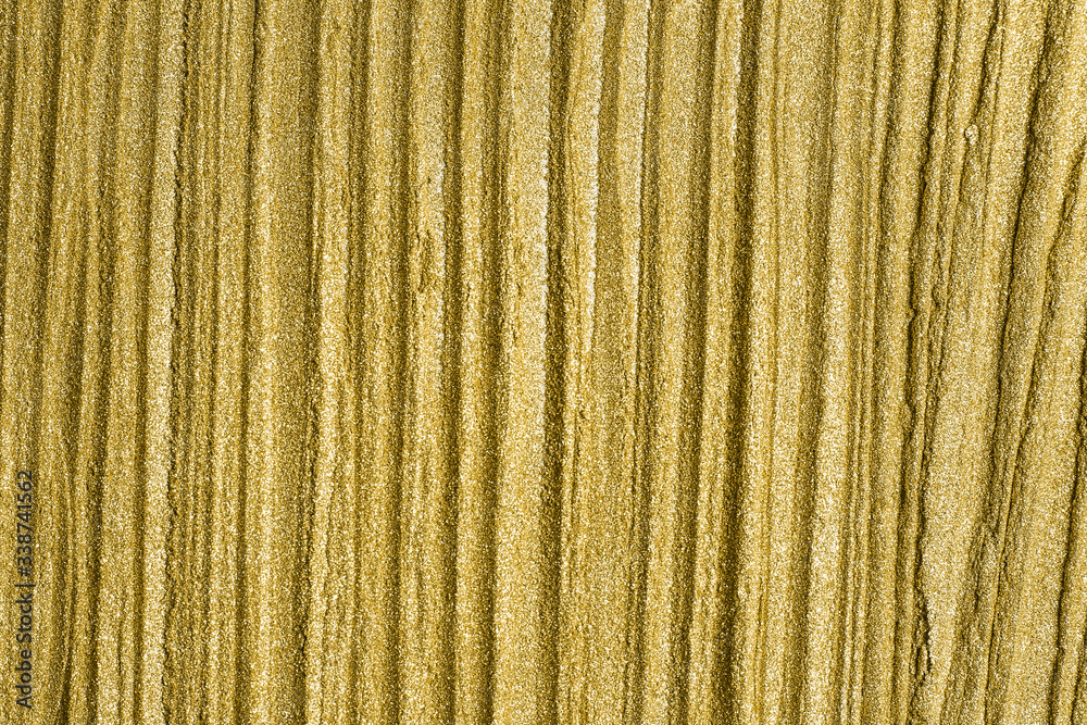 Detailed texture of glittering golden dust surface. Golden Shiny Wallpaper , Perfect for Christmas, New Year or any other Holidays Background. Golden fine powder Detailed texture of glittering golden dust surface. Golden Shiny Wallpaper , Perfect for Christmas, New Year or any other Holidays Background. Golden fine powder