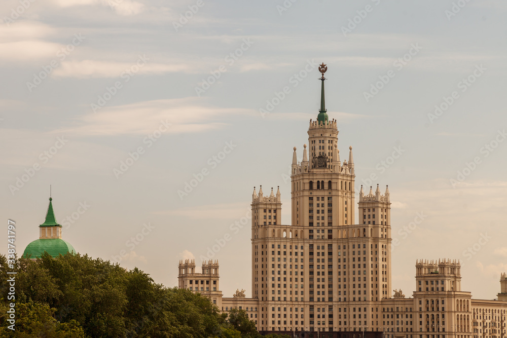 View of the embankment of the Moscow river and the hotel Ukraine in Moscow. View from the observation bridge of Zaryadye Park