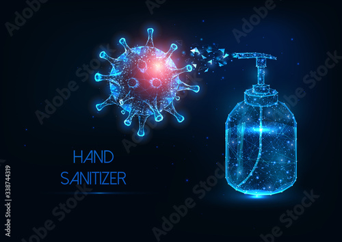 Futuristic glowing low polygonal hand sanitizer bottle against coronavirus banner