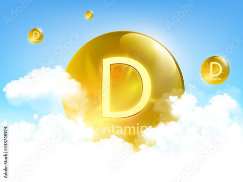 Yellow pill vitamin D against blue sky with clouds