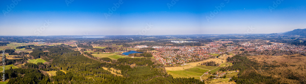 Penzberg city in bavaria. Aerial Panorama. Starnbergersee Lake. Alps with look at Herzogstand, Zugspitze and home garden from the foothills landscape around Penzberg