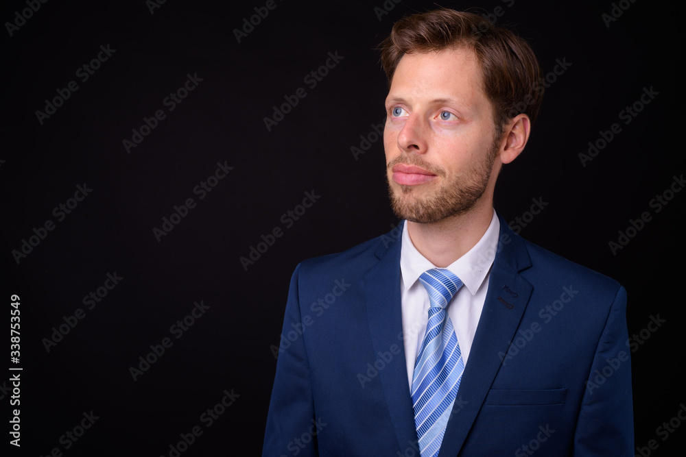 Face of bearded businessman in suit thinking Face of bearded businessman in suit thinking
