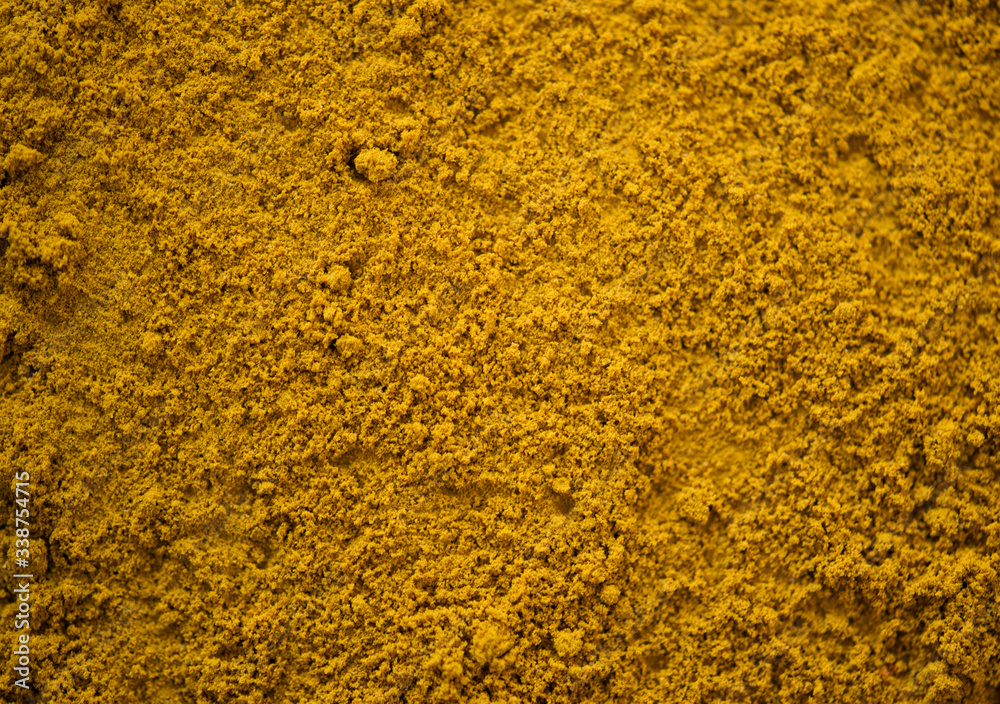 Close up of turmeric powder Close up of turmeric powder