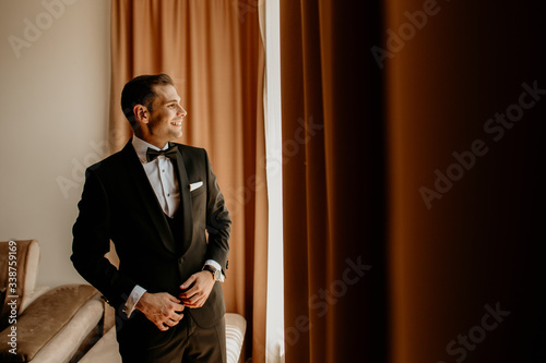 Handsome man posing in suit