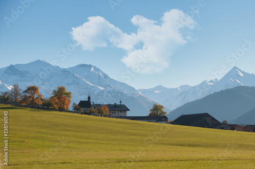 Принти на полотні kitzsteinhorn und imbachhorn im herbst unter wolken blauem himmel gesehen von sc