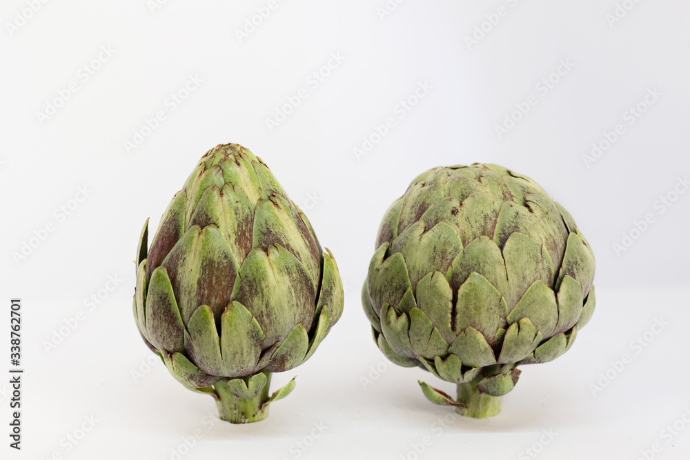 Obraz premium 2 isolated artichokes on a white background s